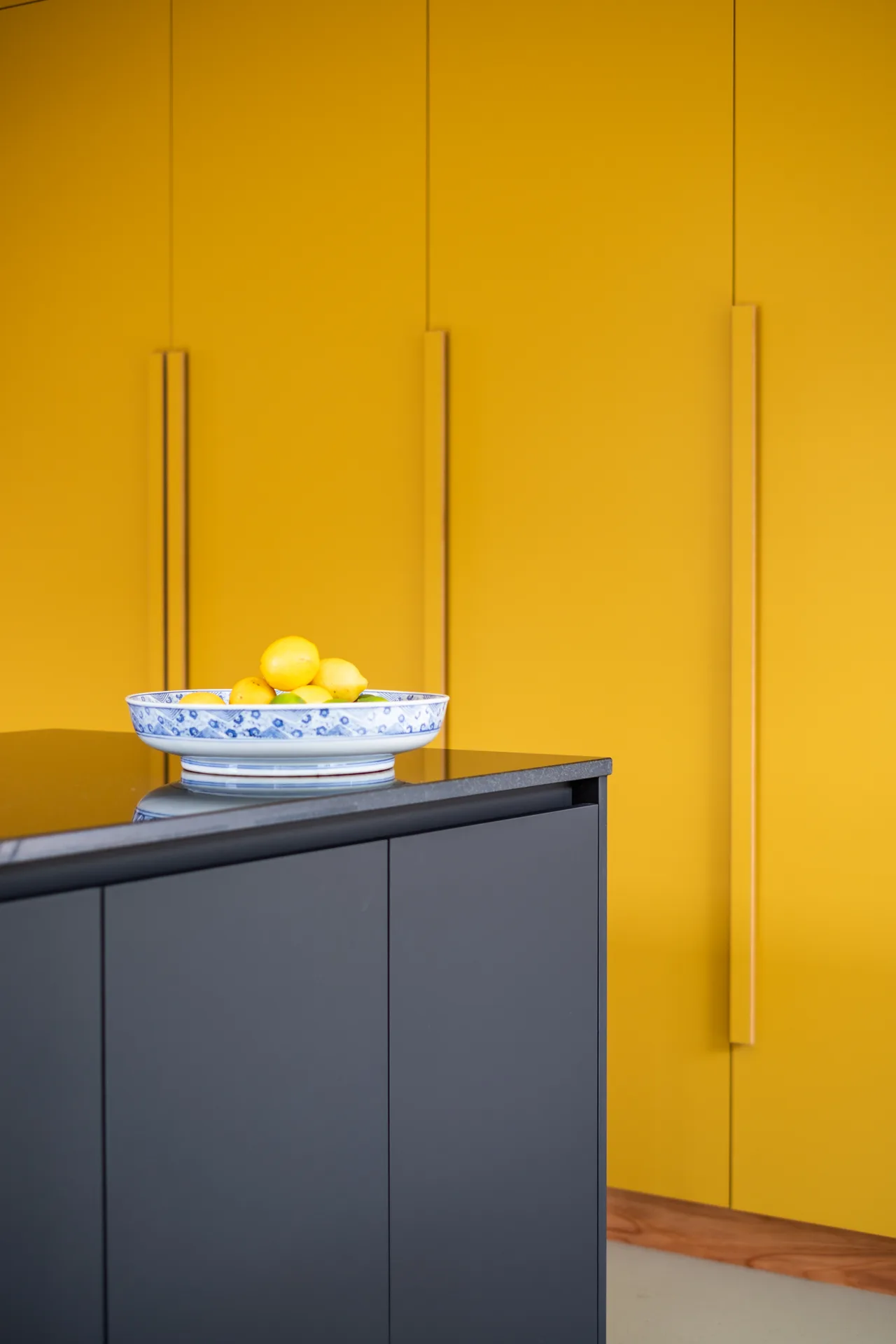 Island Bay Builders - kitchen with yellow and black cabinetry, Wellington